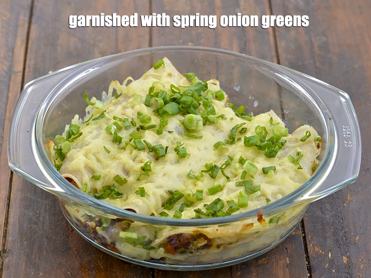 Step 17 – <p><span style="background-color:rgb(255,255,255);color:rgb(0,0,0);">Garnished with 1 tbsp finely </span><a href="https://www.tarladalal.com/glossary-spring-onion-greens-hare-pyaz-ke-patte-445i#ing_2424"><u>chopped spring onion greens</u></a><span style="background-color:rgb(255,255,255);color:rgb(0,0,0);">.</span></p>