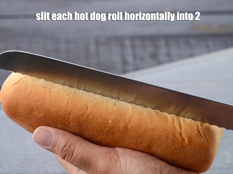 Step 2 – <p><span style="background-color:rgb(255,255,255);color:rgb(0,0,0);">Slit a <strong>hot dog roll</strong> horizontally into 2. using a sharp knife.</span></p>