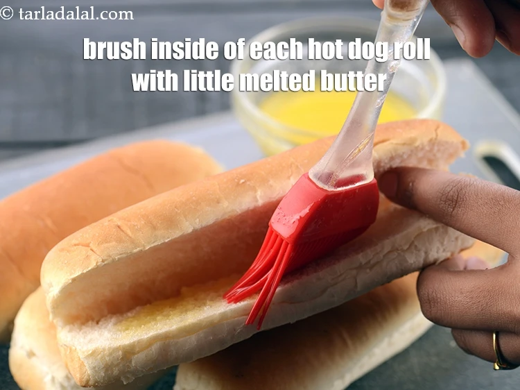 Step 3 – <p><span style="background-color:rgb(255,255,255);color:rgb(0,0,0);">Apply 1 tsp </span><a href="https://www.tarladalal.com/glossary-butter-makhan-233i"><u>butter</u></a><span style="background-color:rgb(255,255,255);color:rgb(0,0,0);"> on each bread halve.</span></p>