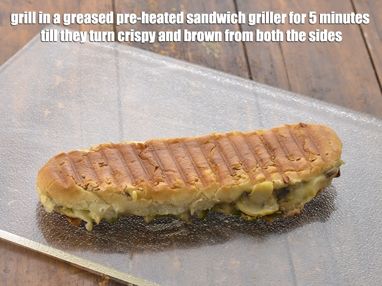 Step 14 – <p><span style="background-color:rgb(255,255,255);color:rgb(0,0,0);"><strong>Grill</strong> in a <strong>greased pre-heated sandwich griller</strong> for 5 minutes till they turn crispy …
