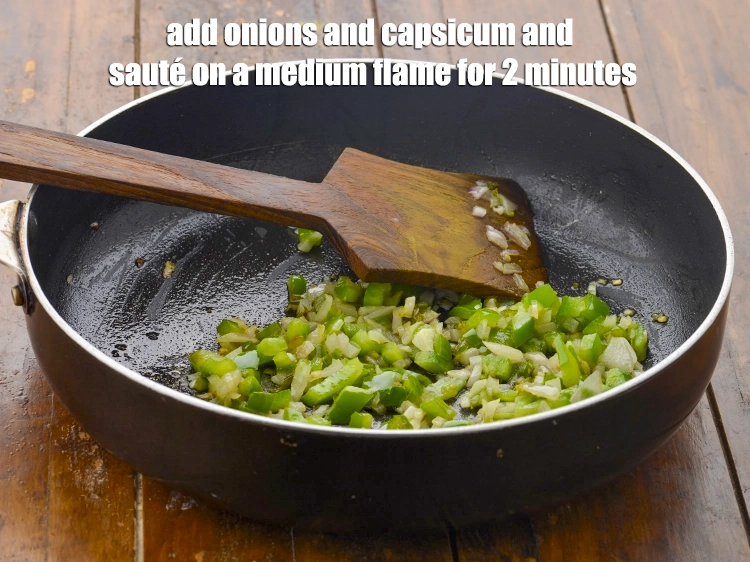 Step 2 – <p><span style="background-color:rgb(255,255,255);color:rgb(0,0,0);">Add the 1/4 cup finely </span><a href="https://www.tarladalal.com/glossary-onions-pyaz-pyaaz-kanda-548i#ing_2327"><u>chopped onion</u></a><span style="background-color:rgb(255,255,255);color:rgb(0,0,0);"> and 1/4 cup </span><a href="https://www.tarladalal.com/glossary-capsicum-shimla-mirch-bell-pepper-163i#ing_2311"><u>chopped …