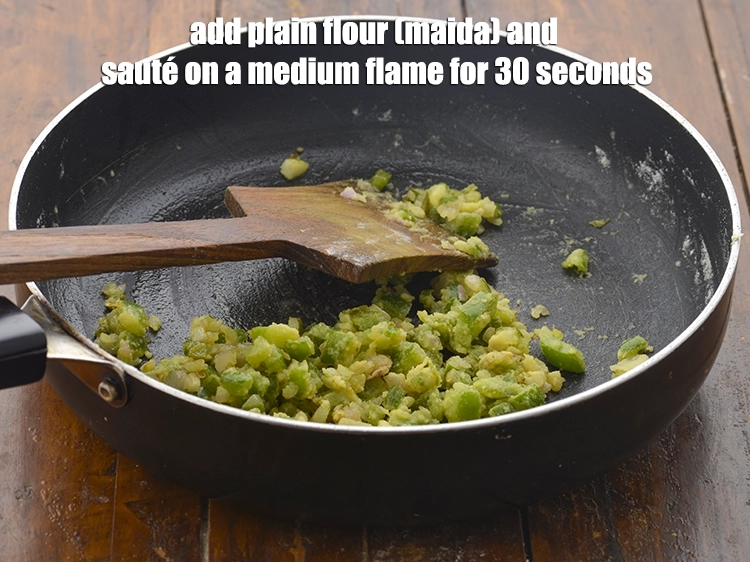 Step 3 – <p><span style="background-color:rgb(255,255,255);color:rgb(0,0,0);">Add the 1 tbsp </span><a href="https://www.tarladalal.com/glossary-plain-flour-maida-188i"><u>plain flour (maida)</u></a><span style="background-color:rgb(255,255,255);color:rgb(0,0,0);"> and <strong>sauté </strong>on a medium …