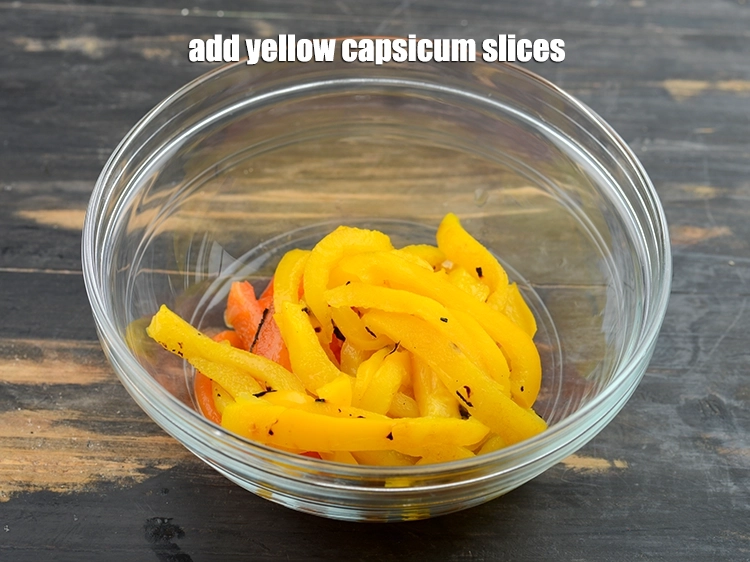 Step 10 – <p><span style="background-color:rgb(255,255,255);color:rgb(0,0,0);">Add </span><a href="https://www.tarladalal.com/glossary-yellow-capsicum-yellow-bell-pepper-yellow-shimla-mirch-171i"><u>yellow capsicum</u></a><span style="background-color:rgb(255,255,255);color:rgb(0,0,0);"> slices.</span></p>