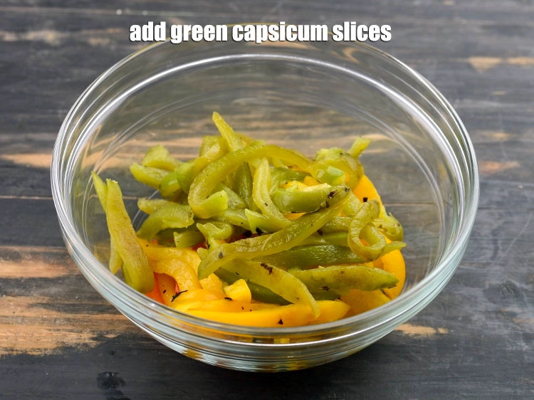 Step 11 – <p><span style="background-color:rgb(255,255,255);color:rgb(0,0,0);">Add green </span><a href="https://www.tarladalal.com/glossary-capsicum-shimla-mirch-bell-pepper-163i"><u>capsicum</u></a><span style="background-color:rgb(255,255,255);color:rgb(0,0,0);"> slices.</span></p>