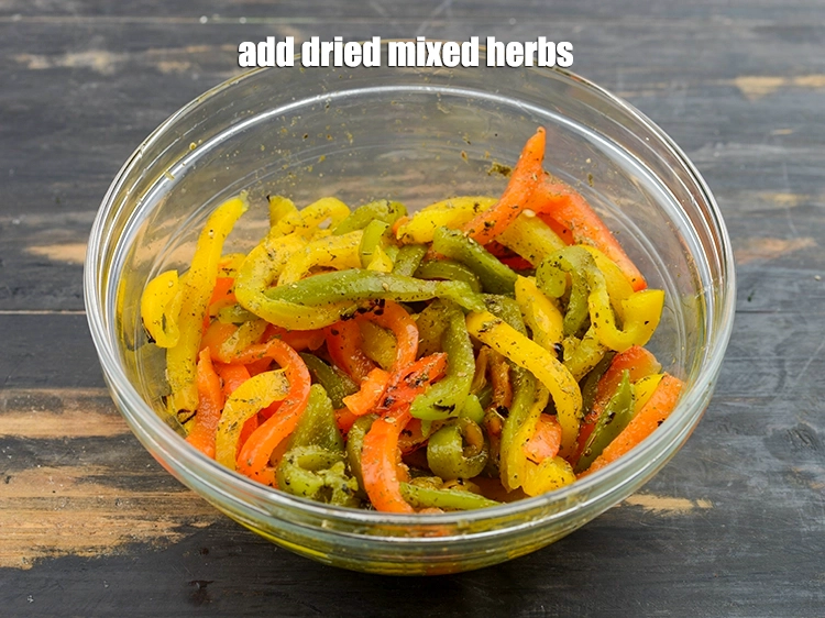 Step 13 – <p>Add <span style="background-color:rgb(255,255,255);color:rgb(0,0,0);">1/2 tsp </span><a href="https://www.tarladalal.com/glossary-dried-mixed-herbs-466i"><u>dried mixed herbs</u></a><u>.</u></p>