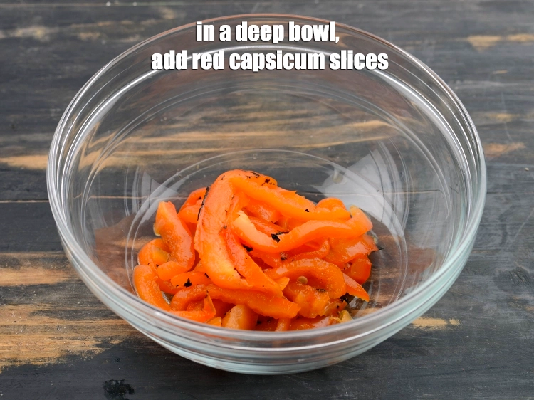 Step 9 – <p><span style="background-color:rgb(255,255,255);color:rgb(0,0,0);">In a deep bowl, add the </span><a href="https://www.tarladalal.com/glossary-red-capsicum-red-bell-pepper-laal-shimla-mirch-172i"><u>red capsicum</u></a><span style="background-color:rgb(255,255,255);color:rgb(0,0,0);"> slices.</span></p>