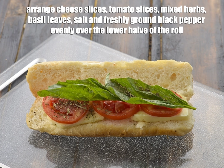 Step 4 – <p>Arrange 2 <a href="https://www.tarladalal.com/glossary-mozzarella-cheese-311i#ing_3098"><u>sliced mozzarella cheese</u></a>, 3 <a href="https://www.tarladalal.com/glossary-tomatoes-tamatar-639i#ing_2512"><u>tomato slices</u></a>, ½ tsp of <a href="https://www.tarladalal.com/glossary-dried-mixed-herbs-466i"><u>dried …