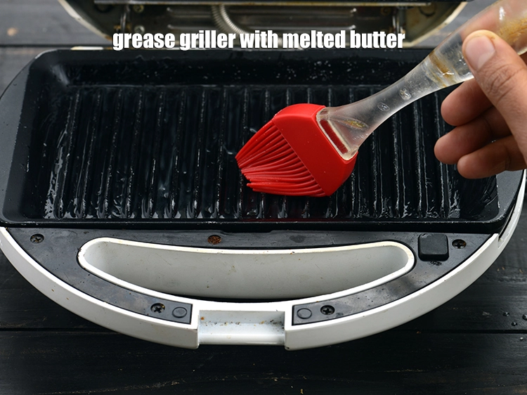 Step 6 – <p><span style="background-color:rgb(255,255,255);color:rgb(0,0,0);">Grease a </span><strong>sandwich griller</strong><span style="background-color:rgb(255,255,255);color:rgb(0,0,0);"> using a brush with ½ tsp of </span><a href="https://www.tarladalal.com/glossary-butter-makhan-233i"><u>butter</u></a><span …