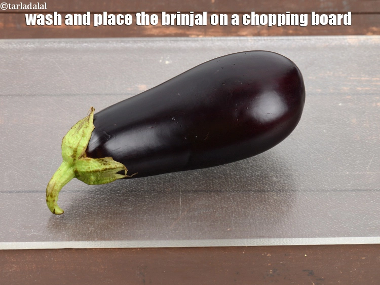 Step 1 – <p>To make the <strong>Eggplant and Mozzarella Panini</strong>, <span style="background-color:rgb(255,255,255);color:rgb(0,0,0);">wash and place the </span><a href="https://www.tarladalal.com/glossary-brinjal-baingan-eggplant-aubergine-128i#ing_2659"><u>brinjal (baingan …