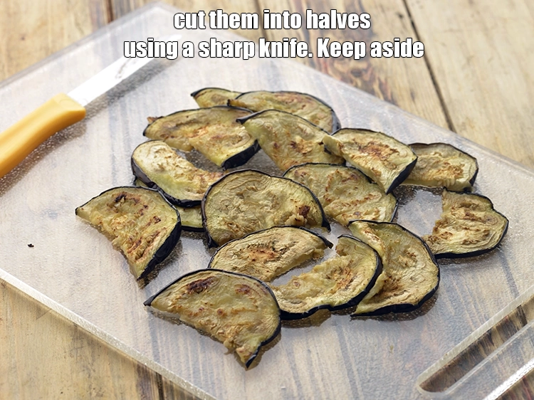 Step 6 – <p><span style="background-color:rgb(255,255,255);color:rgb(0,0,0);">Cool slightly and cut them into halves using a sharp knife. Keep aside.</span></p>