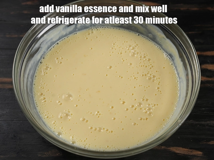 Step 9 – <p><strong>Once cooled</strong>, add the <span style="background-color:rgb(255,255,255);color:rgb(0,0,0);">a few drops of </span><a href="https://www.tarladalal.com/glossary-vanilla-essence-406i"><u>vanilla essence</u></a> and mix well …