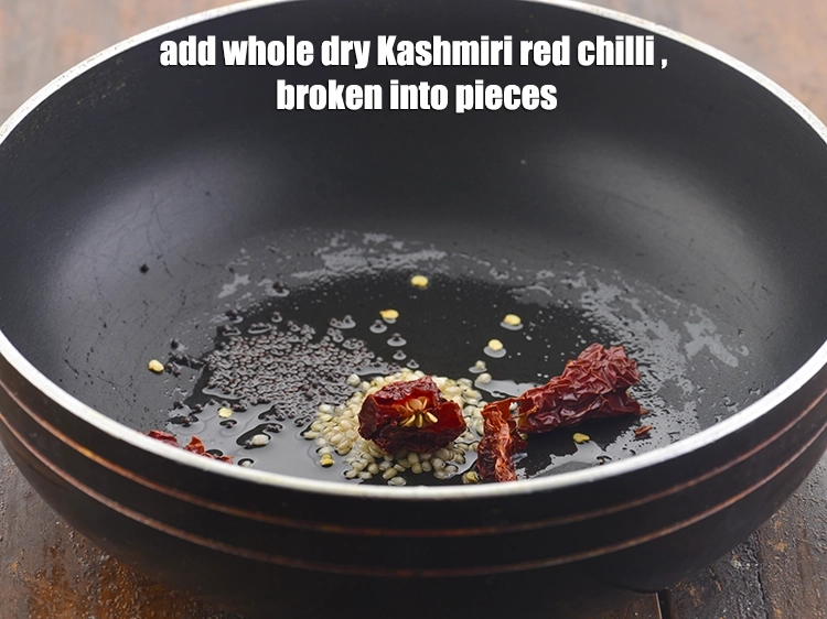 Step 9 – <p>Immediately add the <span style="background-color:rgb(255,255,255);color:rgb(0,0,0);">2 </span><a href="https://www.tarladalal.com/glossary-whole-dry-kashmiri-red-chillies-kashmiri-mirch-kashmiri-lal-mirch-332i"><u>whole dry Kashmiri red chilli </u></a><span style="background-color:rgb(255,255,255);color:rgb(0,0,0);">, broken into …