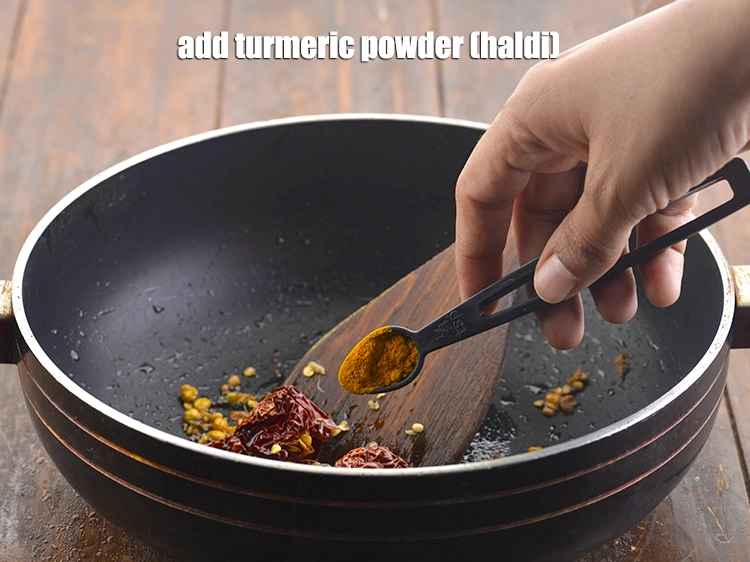 Step 13 – <p><span style="background-color:rgb(255,255,255);color:rgb(0,0,0);">Add the 1/8 tsp </span><a href="https://www.tarladalal.com/glossary-turmeric-powder-haldi-645i"><u>turmeric powder (haldi)</u></a><span style="background-color:rgb(255,255,255);color:rgb(0,0,0);"> for the colour.</span></p>