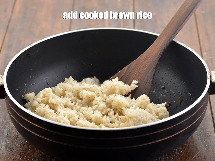 Step 14 – <p><span style="background-color:rgb(255,255,255);color:rgb(0,0,0);">Now, add the 1 1/2 cups </span><a href="https://www.tarladalal.com/glossary-brown-rice-1618i#ing_2895"><u>soaked and cooked brown rice</u></a><span style="background-color:rgb(255,255,255);color:rgb(0,0,0);">. Make …