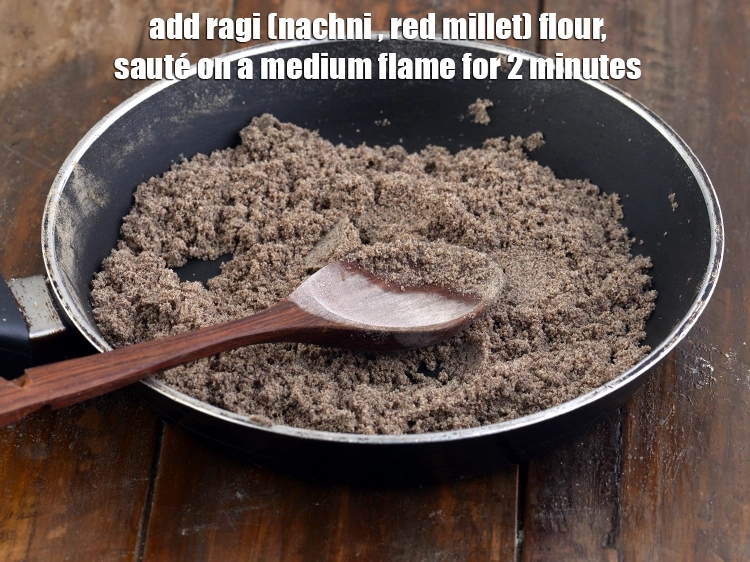 Step 2 – <p><span style="background-color:rgb(255,255,255);color:rgb(0,0,0);">Add the 1/4 cup </span><a href="https://www.tarladalal.com/glossary-ragi-flour-nachni-flour-nachni-ka-atta-red-millet-flour-1115i"><u>ragi (nachni , red millet) flour</u></a><span style="background-color:rgb(255,255,255);color:rgb(0,0,0);"> and <strong>sauté</strong> …