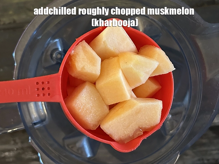 Step 2 – <p>Add the <span style="background-color:rgb(255,255,255);color:rgb(0,0,0);">2 cups chilled roughly </span><a href="https://www.tarladalal.com/glossary-muskmelon-kharbooja-cantaloupe-kharbuj-rock-melon-78i#ing_3027"><u>chopped muskmelon (kharbooja)</u></a><u>.</u></p>