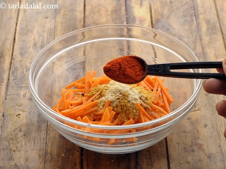 Step 12 – <p>Add the chilli powder. Increases the spice level in the pickle, this can be adjusted …