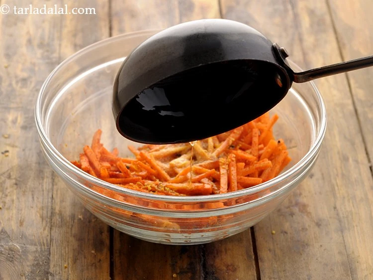 Step 17 – <p>Add the oil to the carrot mixture.</p>