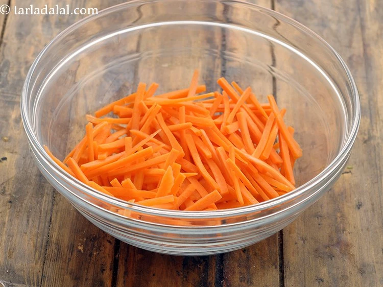 Step 7 – <p>Transfer the carrot to a bowl.</p>