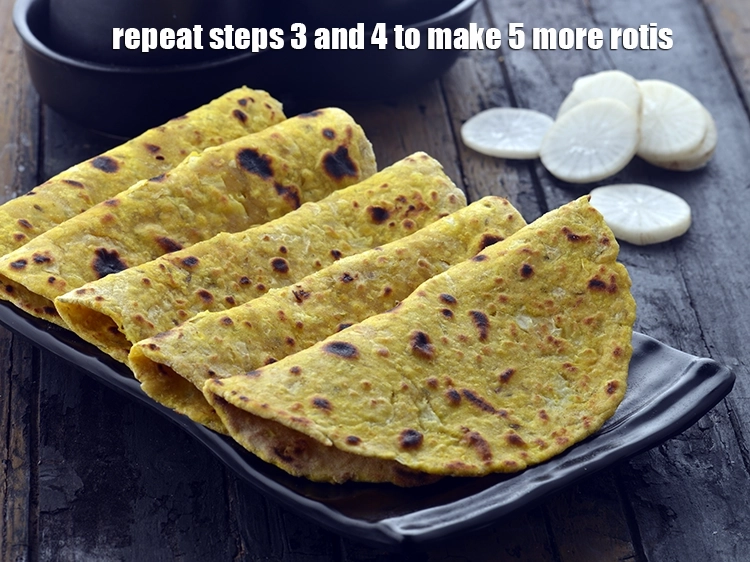 Step 7 – <p><span style="background-color:rgb(255,255,255);color:rgb(0,0,0);">Repeat steps 3 and 4 to make 5 more<strong> rotis</strong>.</span></p>