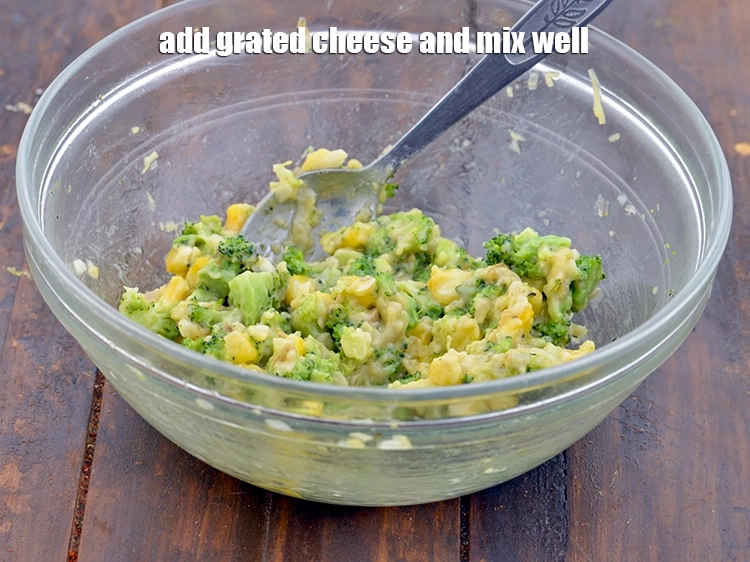 Step 5 – <p><span style="background-color:rgb(255,255,255);color:rgb(0,0,0);">Add the 1/4 cup </span><a href="https://www.tarladalal.com/glossary-processed-cheese-315i#ing_3090"><u>grated processed cheese</u></a><span style="background-color:rgb(255,255,255);color:rgb(0,0,0);">and <strong>mix well</strong>. Keep aside.</span></p>