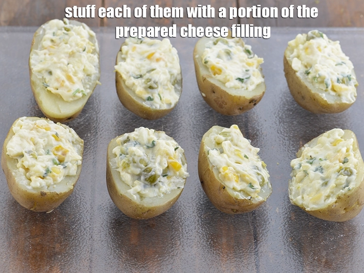 Step 7 – <p><span style="background-color:rgb(255,255,255);color:rgb(0,0,0);">Stuff each of them with a portion of the <strong>prepared cheese filling</strong>.</span></p>