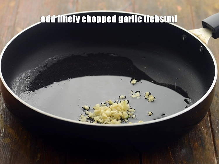 Step 2 – <p><span style="background-color:rgb(255,255,255);color:rgb(0,0,0);">Add the 2 tsp finely </span><a href="https://www.tarladalal.com/glossary-garlic-lehsun-lahsun-348i#ing_2370"><u>chopped garlic (lehsun)</u></a><u>.</u></p>