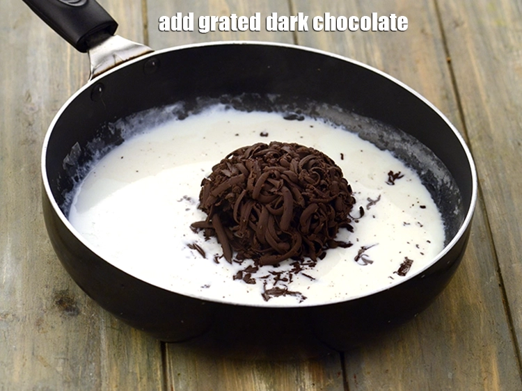Step 2 – <p><span style="background-color:rgb(255,255,255);color:rgb(0,0,0);">Add the 1 cup </span><a href="https://www.tarladalal.com/glossary-dark-chocolate-plain-chocolate-324i#ing_3366"><u>grated dark chocolate</u></a><span style="background-color:rgb(255,255,255);color:rgb(0,0,0);">.</span></p>