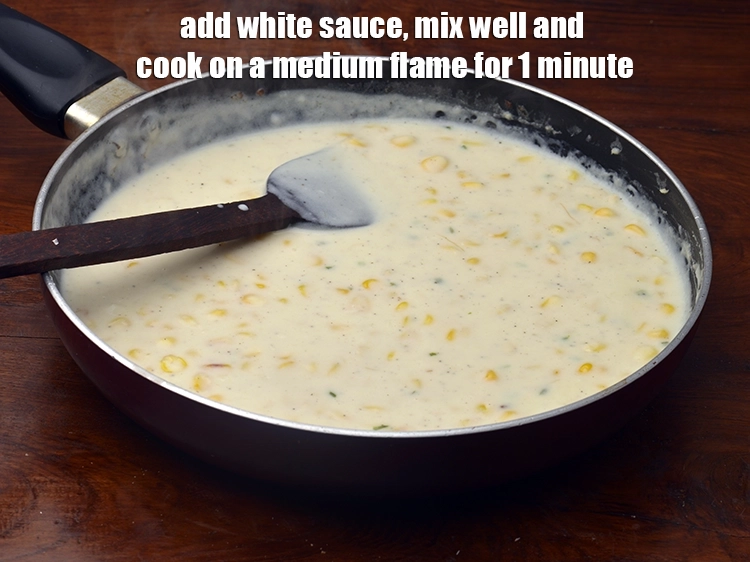 Step 3 – <p><span style="background-color:rgb(255,255,255);color:rgb(0,0,0);">Add the<strong> </strong></span><a href="https://www.tarladalal.com/white-sauce--fun-food-for-children-1890r"><u>white sauce</u></a><span style="background-color:rgb(255,255,255);color:rgb(0,0,0);">, mix well and cook on a medium flame …