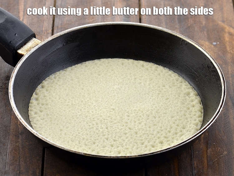 Step 11 – <p><span style="color:rgb(13,13,13);">Cook it, using a little </span><a href="https://www.tarladalal.com/glossary-butter-makhan-233i#ing_3123"><u>butter</u></a><span style="color:rgb(13,13,13);">, till light pink spots appear on …