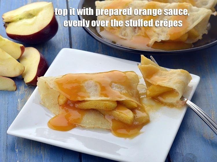 Step 20 – <p><span style="background-color:rgb(255,255,255);color:rgb(0,0,0);">Top it with <strong>prepared orange sauce</strong>, evenly over the stuffed <strong>crêpes</strong>.</span></p>
