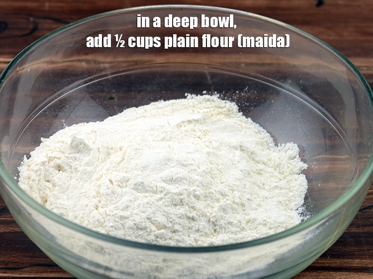 Step 1 – <p>To make the <strong>dough</strong>, i<span style="background-color:rgb(255,255,255);color:rgb(0,0,0);">n a deep bowl, add ½ cups </span><a href="https://www.tarladalal.com/glossary-plain-flour-maida-188i"><u>plain flour …