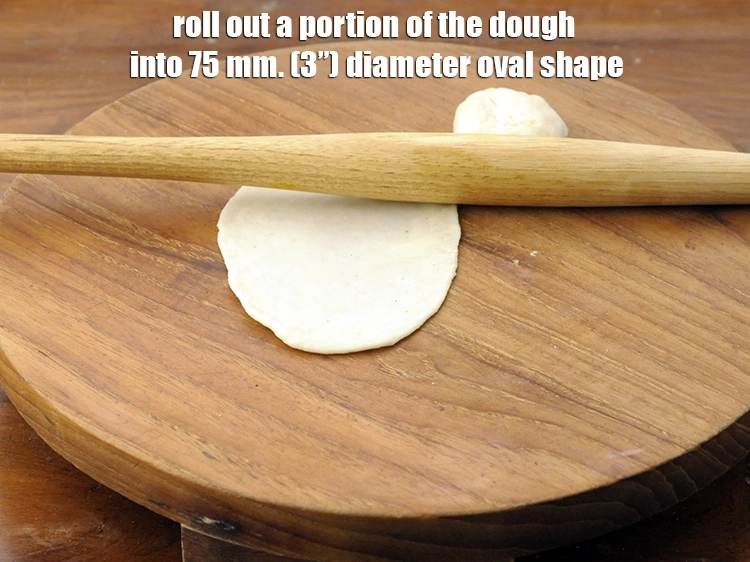 Step 11 – <p>Roll out a portion of the dough into 75 mm. (3”) diameter oval shape.</p>