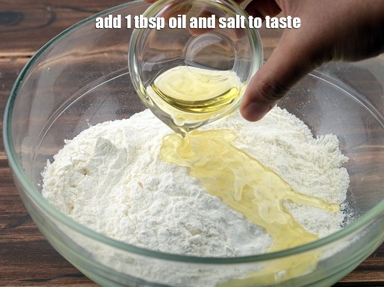 Step 2 – <p>Add the <span style="background-color:rgb(255,255,255);color:rgb(0,0,0);">1 tbsp </span><a href="https://www.tarladalal.com/glossary-oil-671i"><u>oil</u></a><u> and </u><a href="https://www.tarladalal.com/glossary-salt-namak-table-salt-418i"><u>salt </u></a><span style="background-color:rgb(255,255,255);color:rgb(0,0,0);">to taste.</span></p>