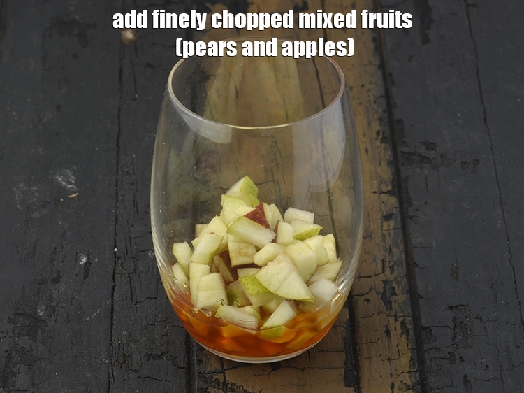 Step 2 – <p><span style="background-color:rgb(255,255,255);color:rgb(0,0,0);">Add the 3 tbsp finely </span><a href="https://www.tarladalal.com/glossary-mixed-fruits-438i#ing_3002"><u>chopped mixed fruits </u></a><span style="background-color:rgb(255,255,255);color:rgb(0,0,0);">(pears and apples).</span></p>
