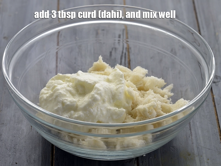Step 5 – <p><span style="background-color:rgb(255,255,255);color:rgb(0,0,0);">Add the 3 tbsp </span><a href="https://www.tarladalal.com/glossary-curd-dahi-yogurt-yoghurt-383i"><u>curd (dahi)</u></a><u>.</u></p>