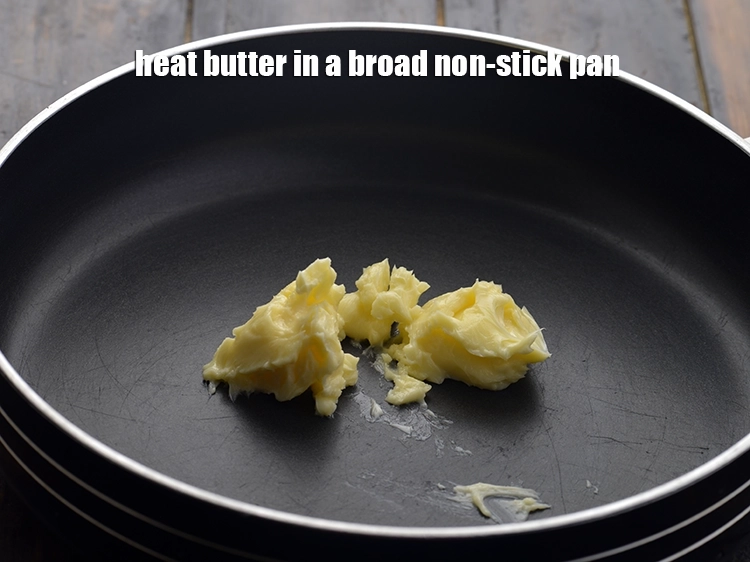Step 3 – <p><span style="background-color:rgb(255,255,255);color:rgb(0,0,0);">Heat the 2 tbsp </span><a href="https://www.tarladalal.com/glossary-butter-makhan-233i"><u>butter</u></a><span style="background-color:rgb(255,255,255);color:rgb(0,0,0);"> in a broad non-stick pan.</span></p>