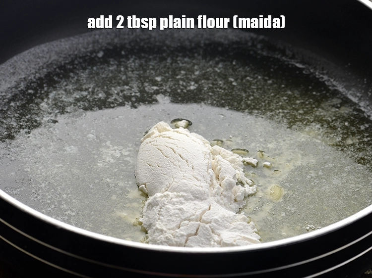 Step 4 – <p><span style="background-color:rgb(255,255,255);color:rgb(0,0,0);">Add the 2 tbsp </span><a href="https://www.tarladalal.com/glossary-plain-flour-maida-188i"><u>plain flour (maida)</u></a><span style="background-color:rgb(255,255,255);color:rgb(0,0,0);">.</span></p>