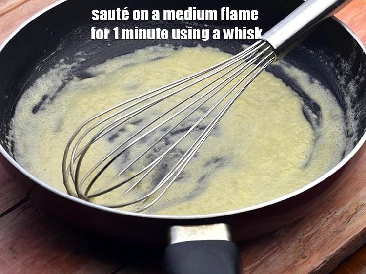 Step 5 – <p><span style="background-color:rgb(255,255,255);color:rgb(0,0,0);"><strong>Sauté </strong>on a medium flame for 1 minute using a whisk..</span></p>