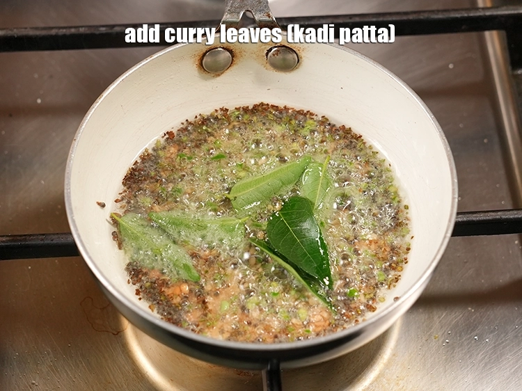 Step 7 – <p><span style="background-color:rgb(255,255,255);color:rgb(0,0,0);">Add the 6 </span><a href="https://www.tarladalal.com/glossary-curry-leaves-kadi-patta-kadipatta-388i"><u>curry leaves (kadi patta)</u></a><span style="background-color:rgb(255,255,255);color:rgb(0,0,0);"> and <strong>sauté</strong> on a medium …