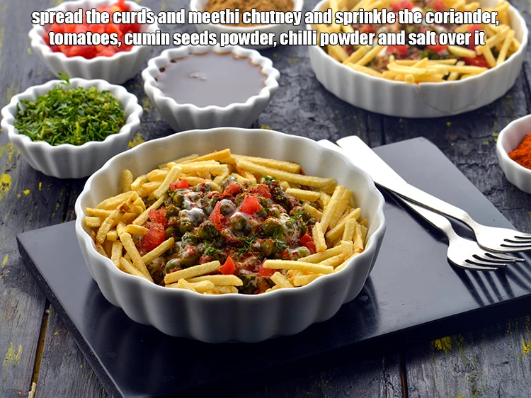 Step 5 – <p><span style="background-color:rgb(255,255,255);color:rgb(0,0,0);">Spread the whisked fresh </span><a href="https://www.tarladalal.com/glossary-curd-dahi-yogurt-yoghurt-383i"><u>curd (dahi)</u></a><span style="background-color:rgb(255,255,255);color:rgb(0,0,0);"> and </span><a href="https://www.tarladalal.com/meetha-chutney--mumbai-roadside-recipes--33379r"><strong><u>meethi chutney</u></strong></a><span style="background-color:rgb(255,255,255);color:rgb(0,0,0);"> and …