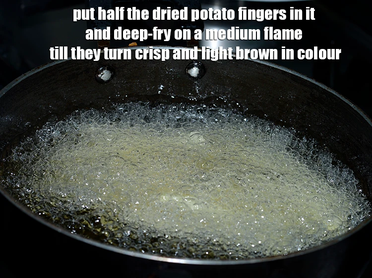 Step 9 – <p><span style="background-color:rgb(255,255,255);color:rgb(0,0,0);">Put half the <strong>dried potato fingers</strong> in it and deep-fry on a medium flame …