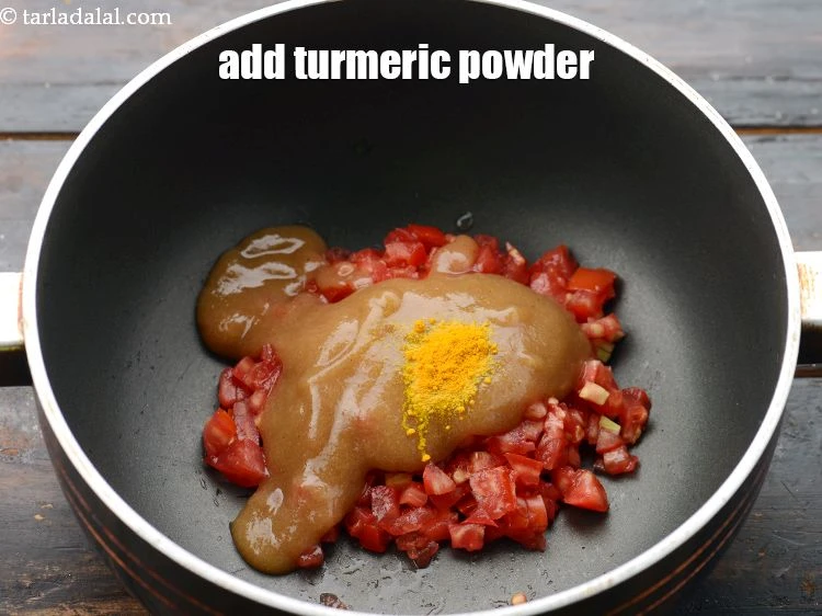 Step 22 – <p><span style="background-color:rgb(255,255,255);color:rgb(0,0,0);">Add&nbsp;a pinch of&nbsp;</span><a href="https://www.tarladalal.com/glossary-turmeric-powder-haldi-645i"><u>turmeric powder (haldi)</u></a><span style="background-color:rgb(255,255,255);color:rgb(0,0,0);">.</span></p>
