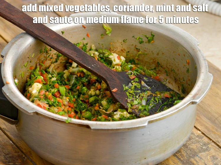 Step 3 – <p><span style="background-color:rgb(255,255,255);color:rgb(0,0,0);">Add the 1 cup finely </span><a href="https://www.tarladalal.com/glossary-mixed-vegetables-mixed-sabzi-723i#ing_2364"><u>chopped mixed vegetables </u></a><span style="background-color:rgb(255,255,255);color:rgb(0,0,0);">(carrot , french beans …