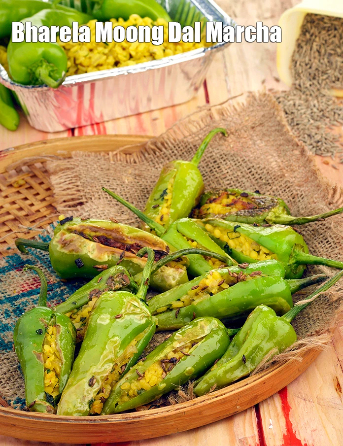 Step 20 – <p><span style="background-color:rgb(255,255,255);color:rgb(0,0,0);">Serve <strong>Stuffed Bhavnagri Chillies, Bharela Moong Dal Marcha</strong> immediately.</span></p>
