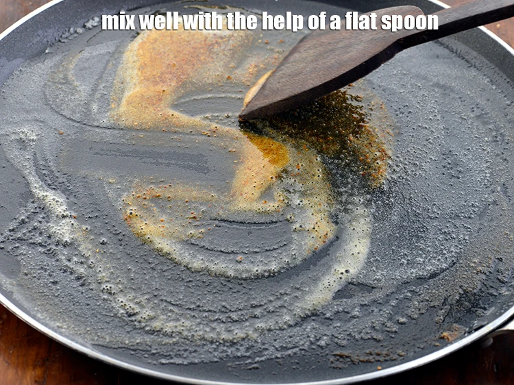 Step 12 – <p><span style="background-color:rgb(255,255,255);color:rgb(0,0,0);">Mix well with the help of a flat spoon.</span></p>