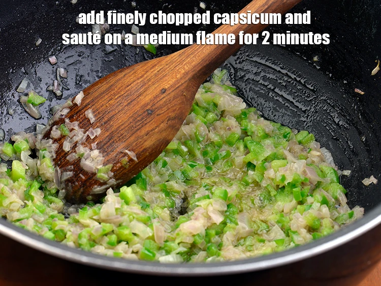 Step 6 – <p><span style="background-color:rgb(255,255,255);color:rgb(0,0,0);">Add the 1/2 cup finely </span><a href="https://www.tarladalal.com/glossary-capsicum-shimla-mirch-bell-pepper-163i#ing_2311"><u>chopped capsicum</u></a><span style="background-color:rgb(255,255,255);color:rgb(0,0,0);"> an <strong>sauté</strong> on a medium …