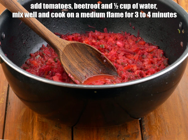 Step 7 – <p><span style="background-color:rgb(255,255,255);color:rgb(0,0,0);">Add the 1 cup finely </span><a href="https://www.tarladalal.com/glossary-tomatoes-tamatar-639i#ing_2361"><u>chopped tomato</u></a><span style="background-color:rgb(255,255,255);color:rgb(0,0,0);">, 3/4 cup </span><a href="https://www.tarladalal.com/glossary-beetroot-chukandar-201i#ing_2407"><u>grated beetroot</u></a><span …