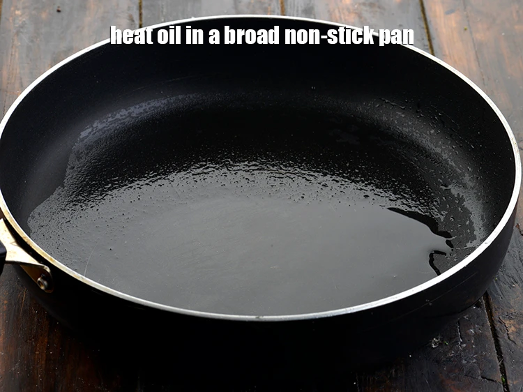 Step 2 – <p><span style="background-color:rgb(255,255,255);color:rgb(0,0,0);">Heat the 1 tbsp </span><a href="https://www.tarladalal.com/glossary-oil-671i"><u>oil</u></a><span style="background-color:rgb(255,255,255);color:rgb(0,0,0);"> in a broad non-stick pan.</span></p>