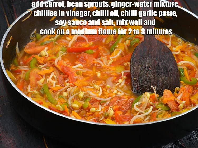 Step 6 – <p><span style="background-color:rgb(255,255,255);color:rgb(0,0,0);">Add the 1/2 cup </span><a href="https://www.tarladalal.com/glossary-carrot-gajar-gajjar-253i#ing_2385"><u>grated carrot</u></a><span style="background-color:rgb(255,255,255);color:rgb(0,0,0);">, 1 cup </span><a href="https://www.tarladalal.com/glossary-bean-sprouts-193i"><u>bean sprouts</u></a><span style="background-color:rgb(255,255,255);color:rgb(0,0,0);">, …